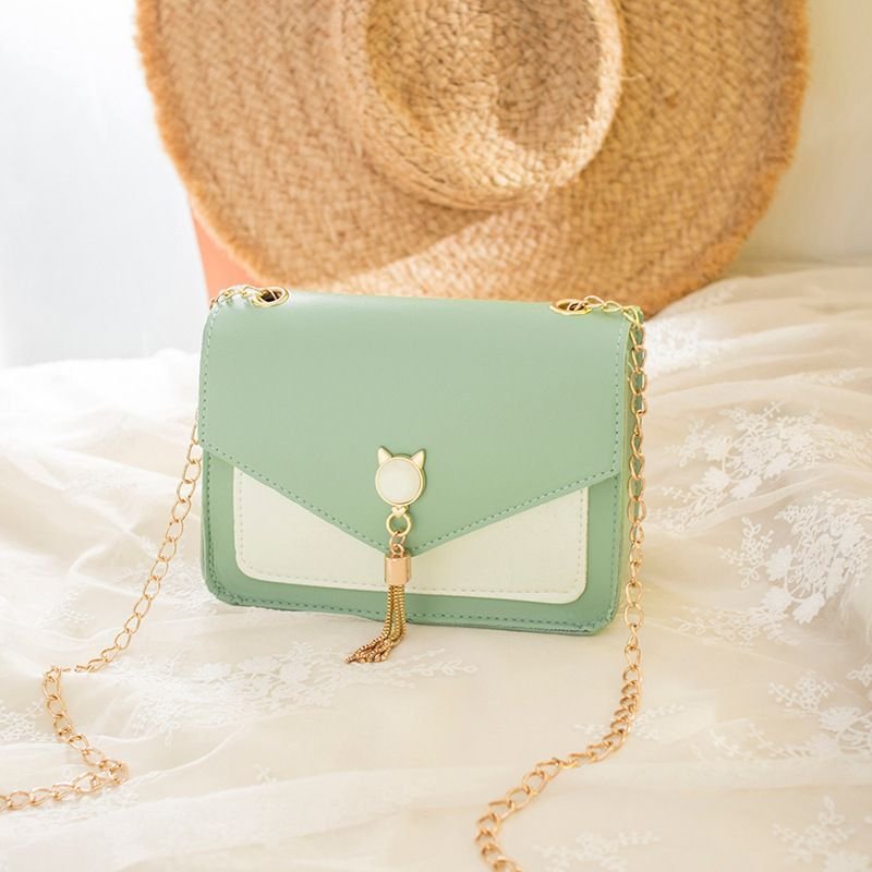 Women Chic Flap Buckle Design Cat Tassel Decoration Color Blocking PU Crossbody Bag